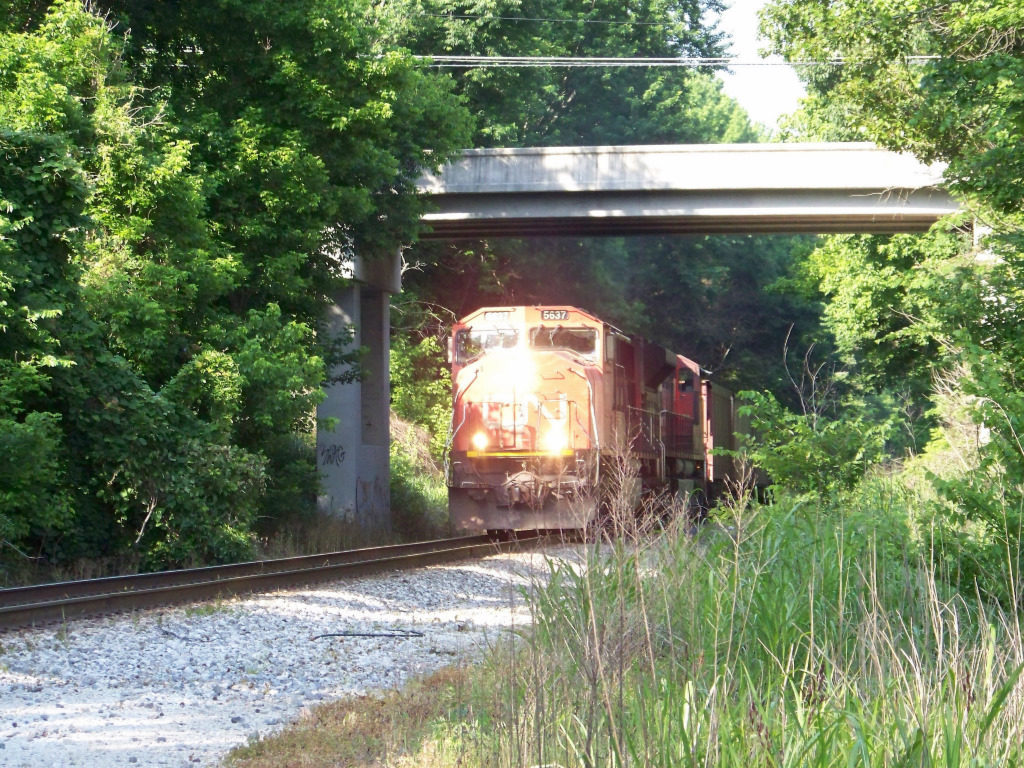 Atoka, Tennessee, freight going underneith bridge on Main Street.